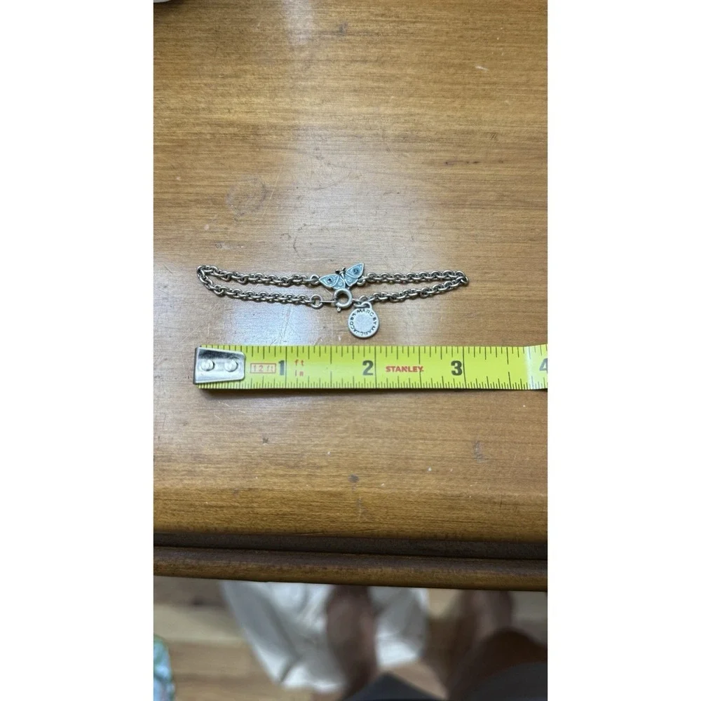 Marc Jacob's Silver butterfly charm bracelet